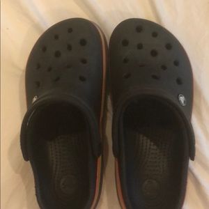 Women’s black rainbow striped crocs